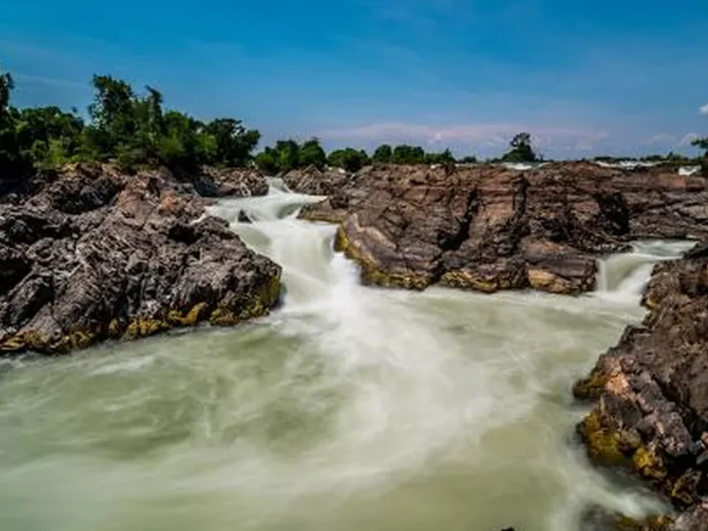 Powerful Mekong rapids in southern Laos, illustrating a Don Det and Don Khon island adventure.